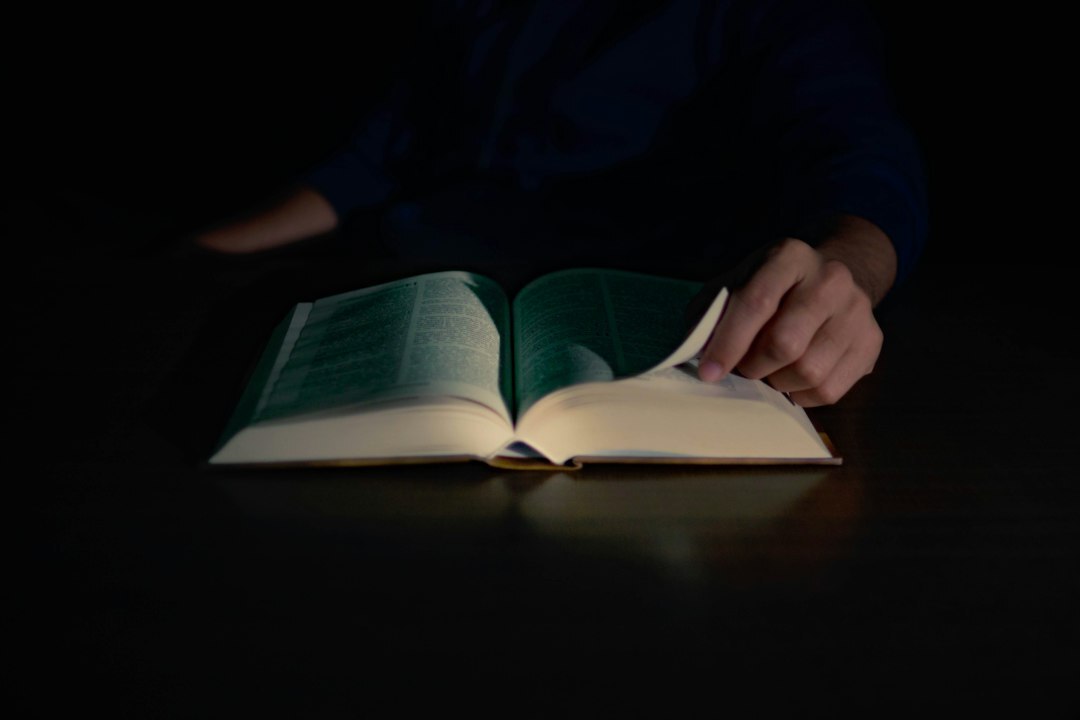open mystery book at night